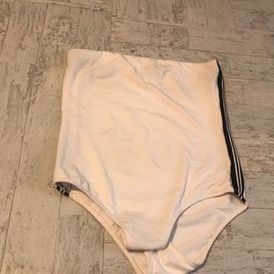 Tube top that button in between your legs